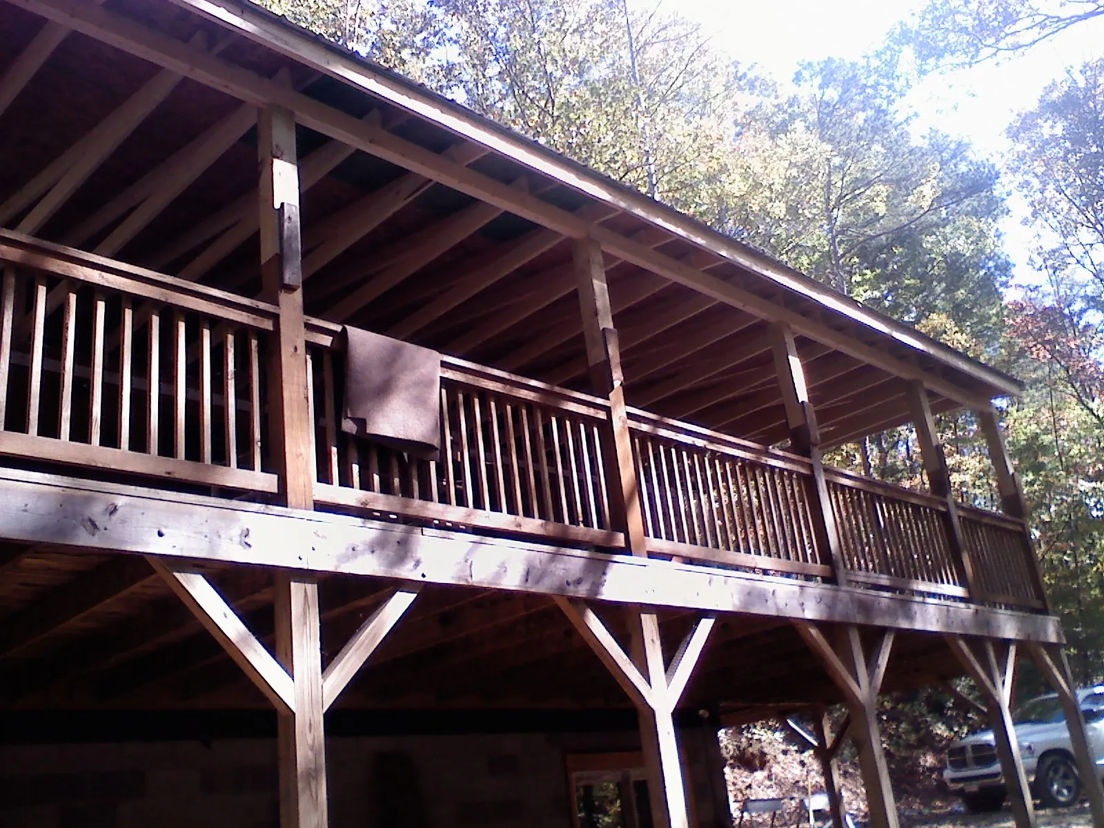 Timber framing under a new elevated porch and deck — Roof Leak Repair in Greensboro by Roofing Brothers